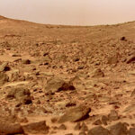 New detections of feldspar-bearing volcanic rocks in the walls of Valles Marineris, Mars